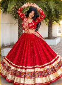 Red bandhani chaniya choli mid-dance
